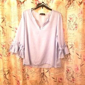 Ivanka Trump size large color baby blue